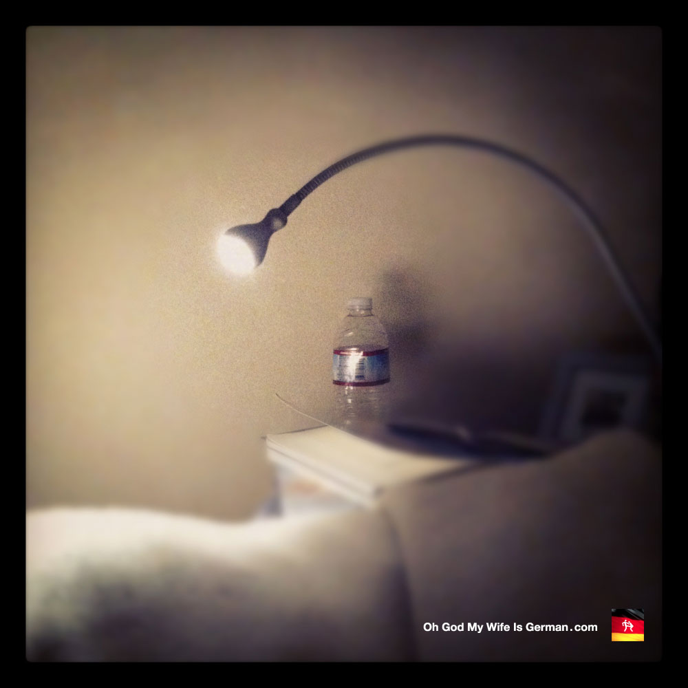 Bedroom reading lamp from Ikea and a water bottle