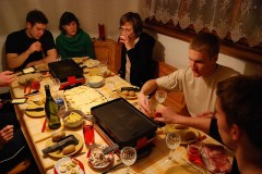 A traditional Swiss raclette dinner evening with table-top grill