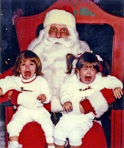 Funny Santa at Christmas with screaming, crying kids.