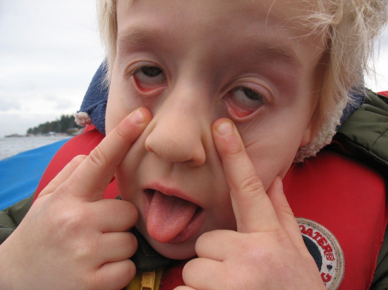 funny-kid-making-face-eyes-zombie-tired