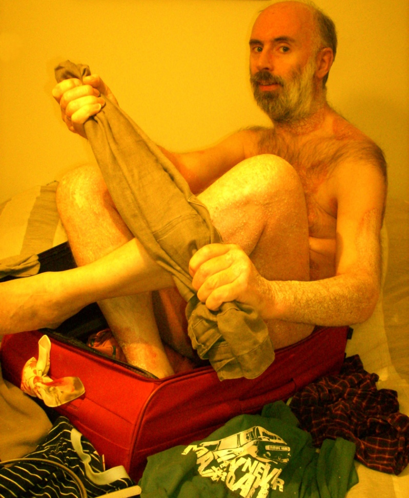 04-naked-man-hairy-funny-in-suitcase-old