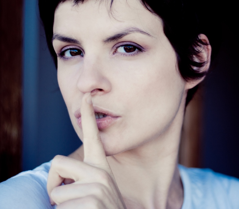 hush-dont-speak-finger-to-lips-woman-german-proverbs